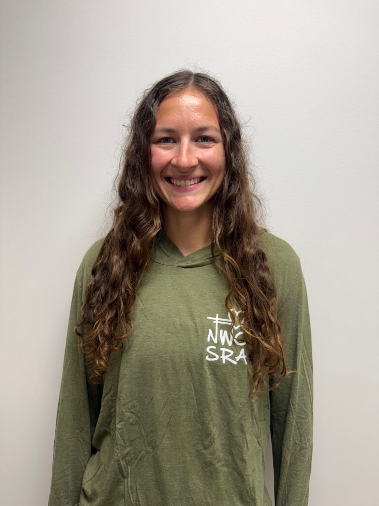 Headshot of Emily DeVaux, program cordinator